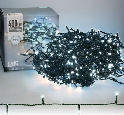 A pile of white LED string lights is shown next to its packaging.