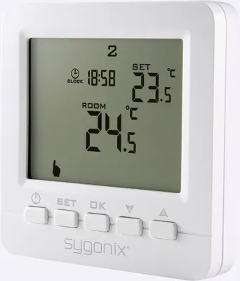 A white digital thermostat is shown against a white background.