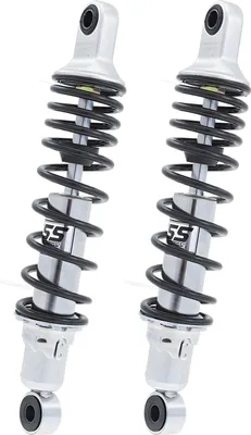 Two motorcycle shock absorbers are shown against a white background.