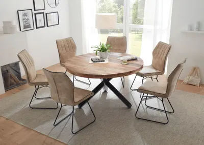 A dining room set with a round wooden table and six chairs.