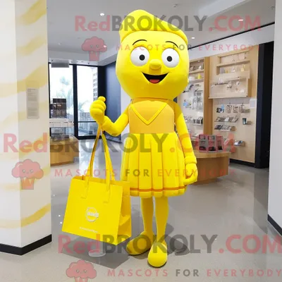 Obrázek produktu pro Postava REDBROKOLY maskota žluté bonboniéry s pouzdrovými šaty a taškami
