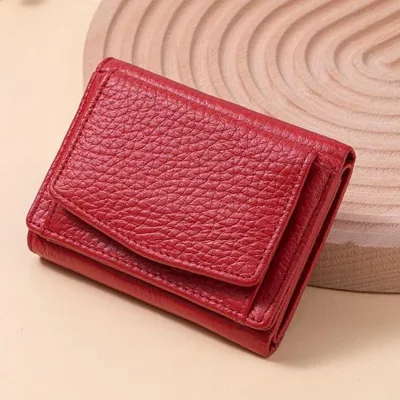 Immagine prodotto di Portafoglio da donna in vera pelle, con protezione RFID, pieghevole in tre, con scomparto per monete e 7 scomparti per carte
