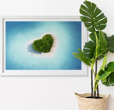 Produktbild von Moosbild mit Echtem Isländisch Moos - 60x40 cm - Weißer MDF-Rahmen - Herzförmige Insel
