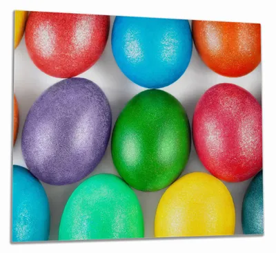 Produktbild von Wallario Herdabdeckplatte aus Glas, Größe 60 x 52 cm 1-teilig, Motiv Bunte Oster-Eier in Nahaufnahme mit kräftigen Farben