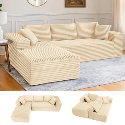 A beige corduroy sectional sofa with a chaise lounge is shown in a room setting.
