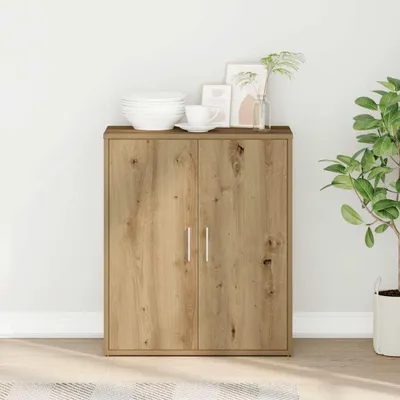 A wooden sideboard with two doors, decorated with plates and pictures on top, and a plant to the side.