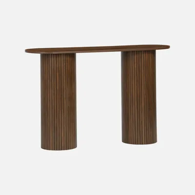 A wooden console table with an oval top and two cylindrical, fluted legs, presented against a plain white background.