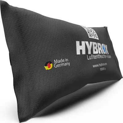 A black dehumidifier pillow with branding and text.