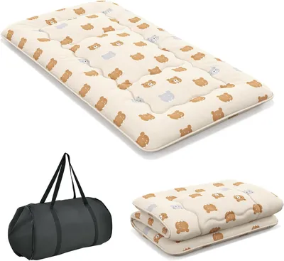 A product image showing a folded mattress and a duffel bag.