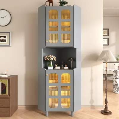 A gray corner cabinet with glass doors and internal lighting, placed in a room with a clock and a floor lamp.