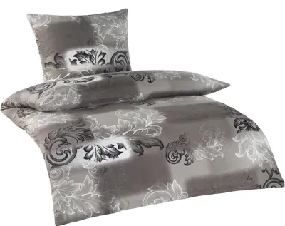 A bedding set with a damask pattern.