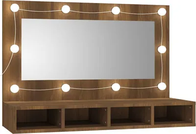 A vanity mirror with lights and storage shelves.