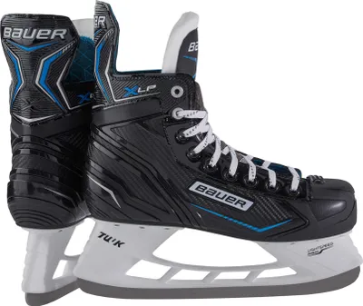 A pair of black Bauer hockey skates with white laces and blue accents, shown from the side against a white background.