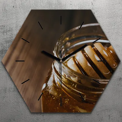 Produktbild von Uhr hexagonal 40 cm Glas Geräuschlos schwarze Zeiger - Honigglas mit Honigstab