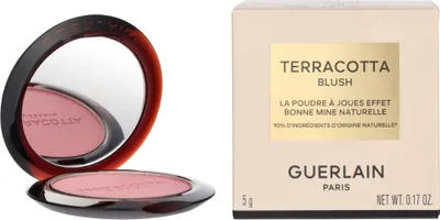 A makeup compact and its packaging are shown against a white background.
