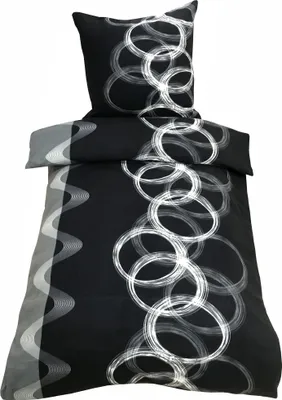 A duvet cover and pillowcase set with a black background and a white circular pattern.