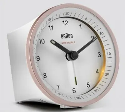 A close-up studio shot of a Braun alarm clock.