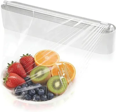 Immagine prodotto di Taglia-pellicole con lama - Sistema di organizzazione magnetico per la cucina, ideale per la carta forno e l'alluminio