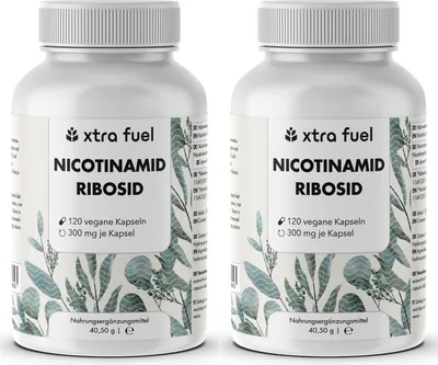 Two bottles of dietary supplement on a white background with a botanical illustration.