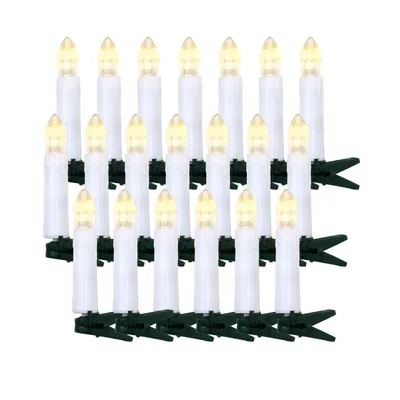 A set of LED Christmas tree candles with green clips.