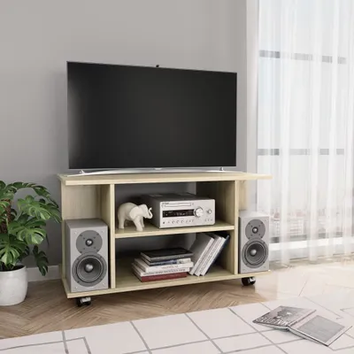 A TV stand with a TV, speakers, and electronic equipment in a room.