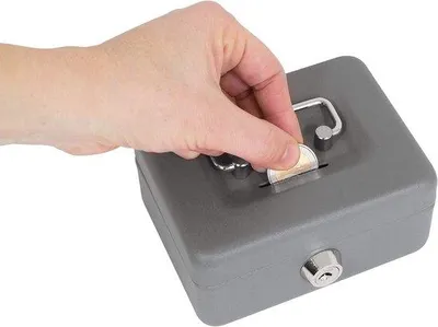 Immagine prodotto di Con fessura in acciaio per oggetti di valore | Compatto e sicuro per denaro e oggetti di valore | 12,5 cm