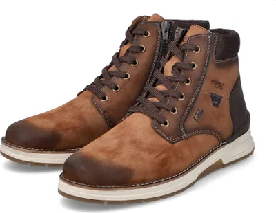 A pair of brown leather boots on a white background.