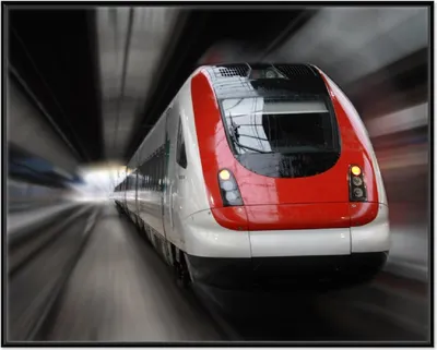 Produktbild von Wallario Wandbild Fahrender Zug von vorn in rot- Perspektive von vorn, Größe: 40,30 x 50,30 cm, Poster mit schwarzem Aluminiumrahmen