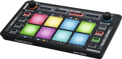 A DJ controller with illuminated pads and knobs, presented on a white background.