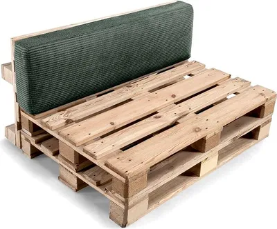 A sofa cushion set made from wooden pallets and a green cushion.