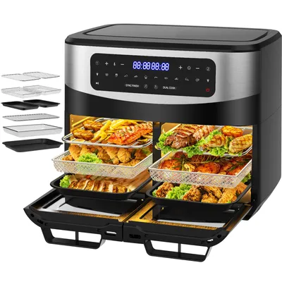 A dual-chamber air fryer with food inside, and accessories shown to the side.