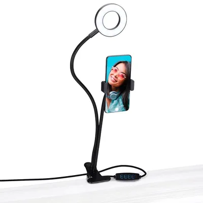 Immagine prodotto di Luce anulare Grundig con supporto per cellulare - Luce per selfie con morsetti da tavolo - Luce anulare da 9 cm con 24 LED - 3 modalità di luce e 9 livelli di luminosità - Alimentazione USB - Bracci flessibili