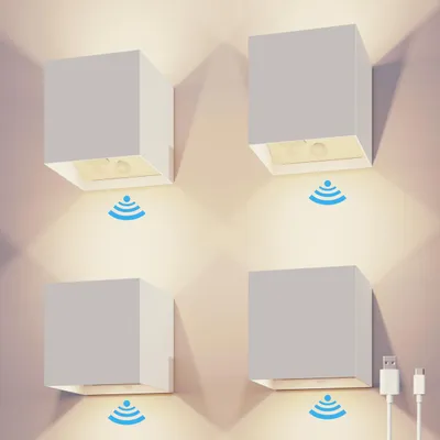 Produktbild von Calex Volterra Wandleuchte, für Außen & Innen, warmweißes Up & Down Licht, Akku aufladbar mit USB-C, kabellos, Bewegungsmelder, wasserdicht, Weiß, 4er Pack