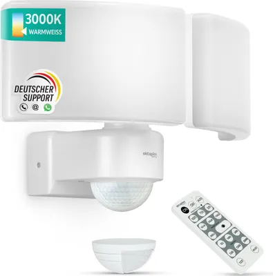 A white LED floodlight with a motion sensor and remote control is displayed against a white background.