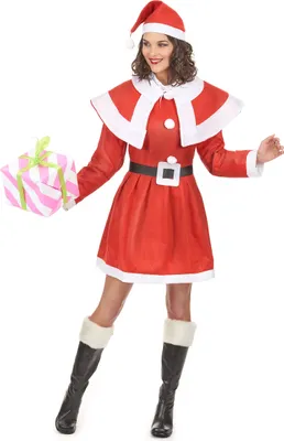 A woman in a Santa costume holding a gift.