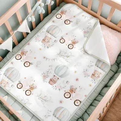 Produktbild von Waschbare Wickelunterlage für Babys, saugfähig und atmungsaktiv
