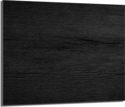 A close-up of a black wooden surface.