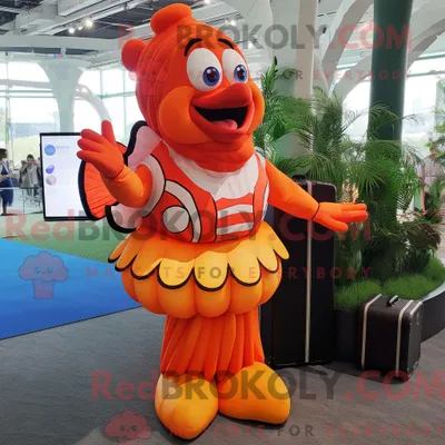 Productafbeelding van Mascottefiguur REDBROKOLY van een oranje clownvis gekleed met een maxirok en aktetassen