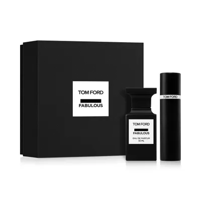 A black gift set box with two Tom Ford Fabulous perfume bottles.