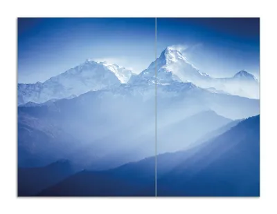Produktbild von Wallario Herdabdeckplatte aus Glas, Größe 70 x 52 cm 2-teilig, Motiv Sonnenaufgang  in  den  Bergen