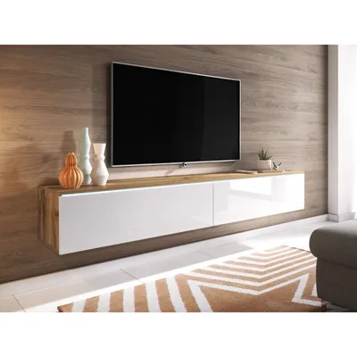 A modern living room with a wall-mounted TV and entertainment unit.