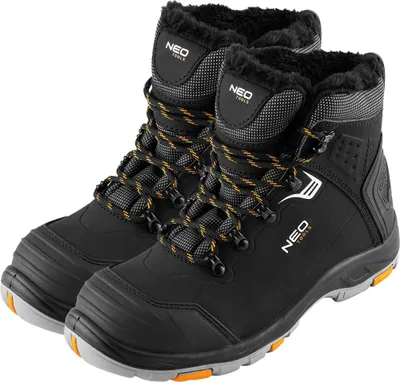 A pair of black work boots with yellow and gray laces, set against a white background.