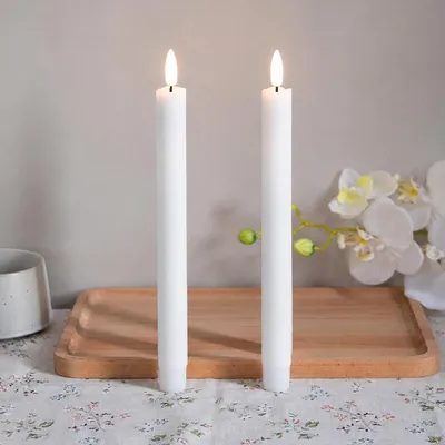 Immagine prodotto di 2 candele a LED, luce calda, 25 cm, senza fiamma, alimentate a batteria, ideali per decorazioni natalizie, matrimoni, feste e altri eventi, colore bianco