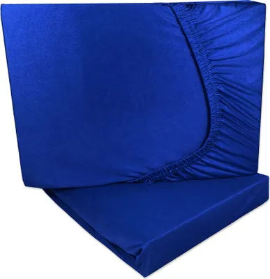 Two royal blue fitted sheets are stacked on top of each other, with the top sheet slightly pulled back to reveal the elastic edge.