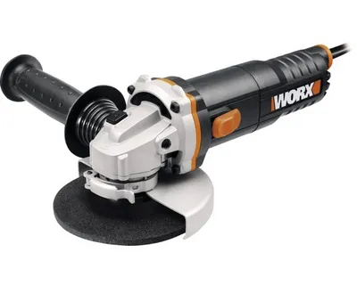 A studio shot of a black and orange angle grinder on a white background.