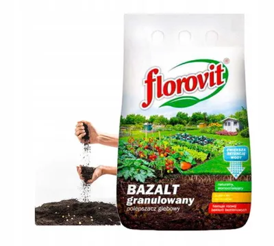 A bag of fertilizer with an illustration of a garden and hands holding soil.