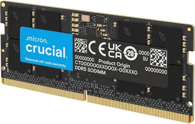 A close-up, angled view of a Crucial DDR5 SODIMM RAM module against a black background.