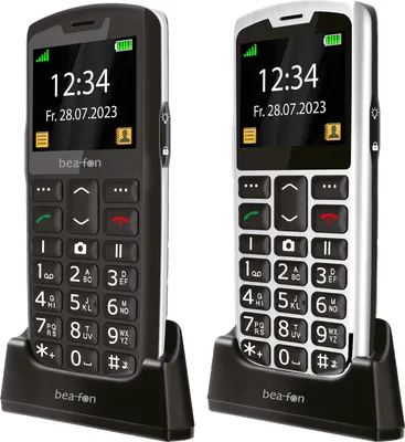 Two Bea-Fon SL260 LTE mobile phones, one black and one silver, are shown in their charging docks against a white background.
