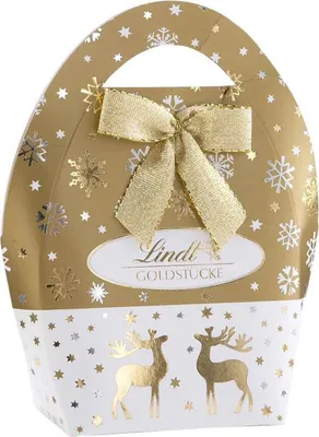 A festive Lindt chocolate gift bag with a handle, decorated with snowflakes and reindeer.