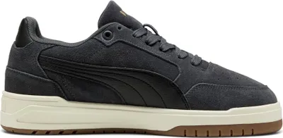 A side view of a gray Puma sneaker with black accents and a beige sole.